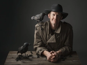 Ravens, a man, Hat